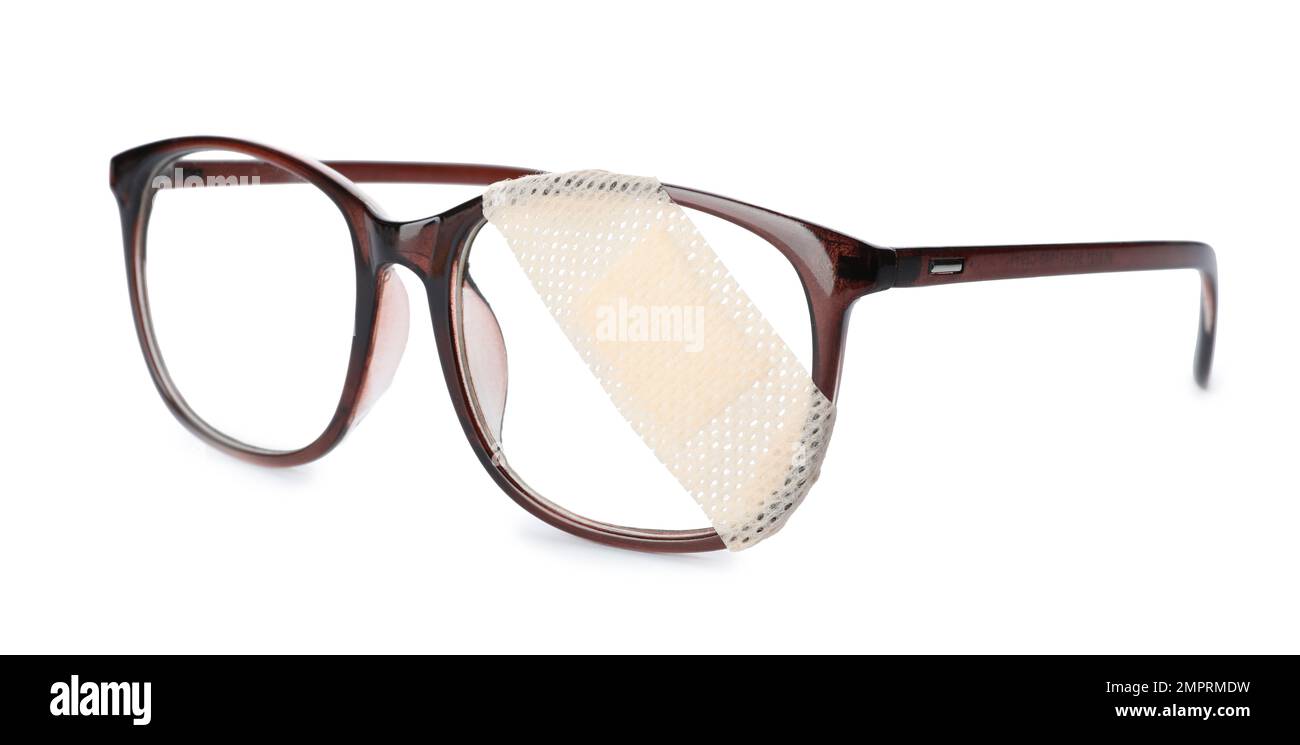 Glasses with sticking plaster isolated on white Stock Photo Alamy