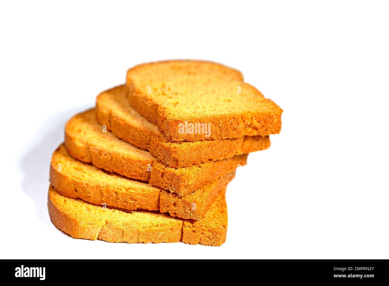 Rusk slices isolated against white background Stock Photo - Alamy