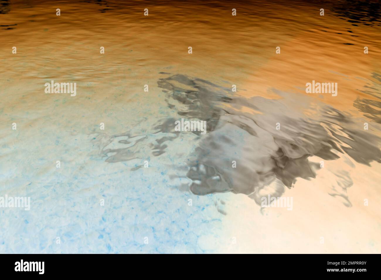 Abstract photo of the surface of the water with the reflection of light ...