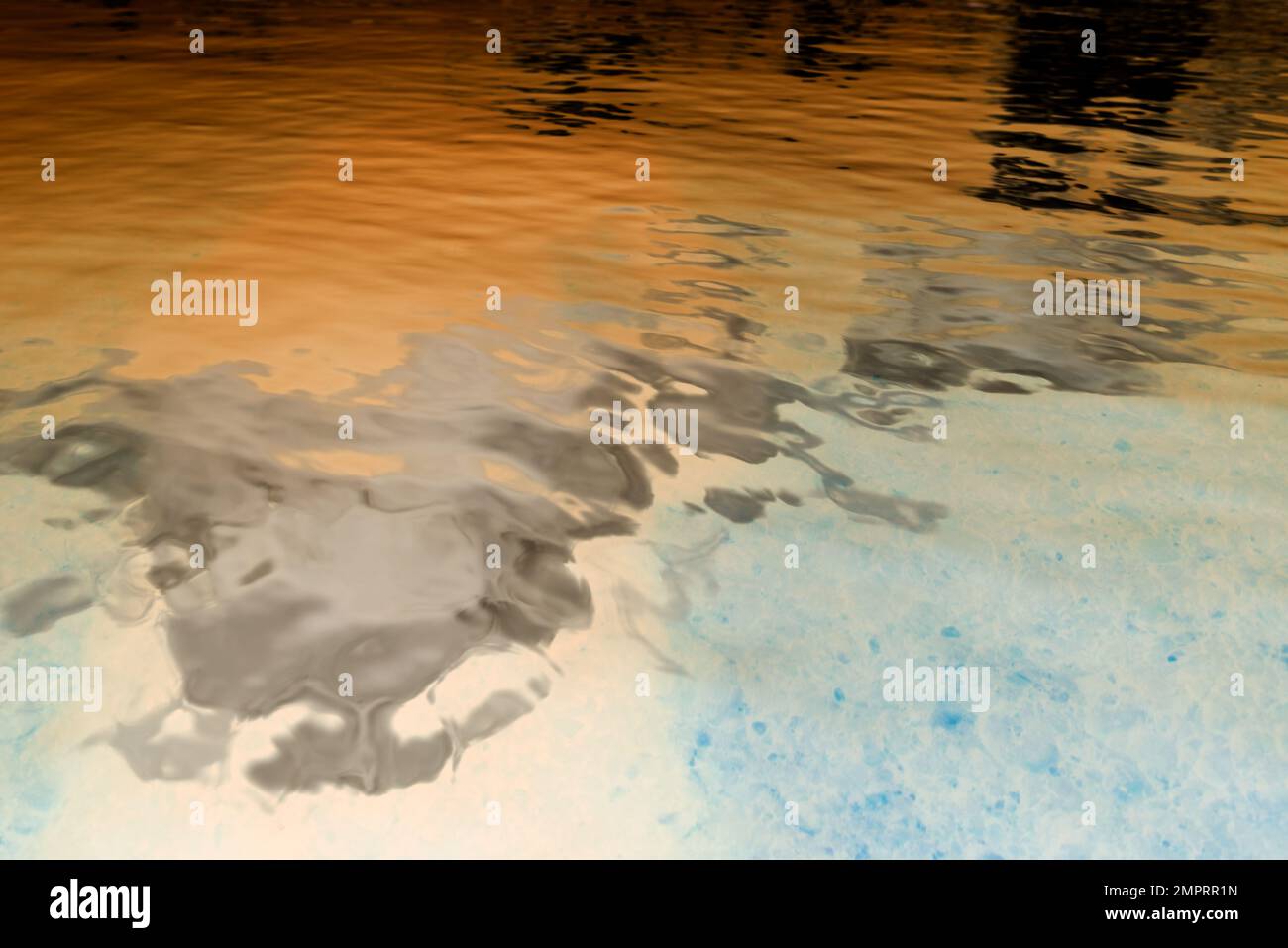 Abstract photo of the surface of the water with the reflection of light ...