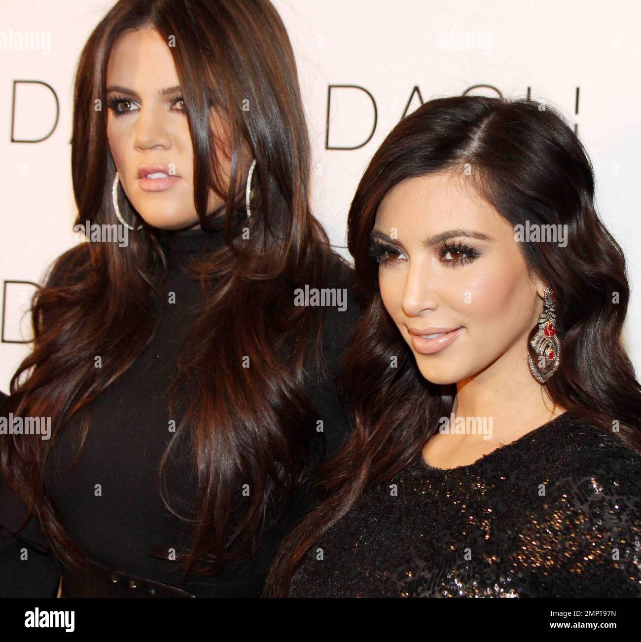 Khloe and Kim Kardashian attend the grand opening of DASH boutique in