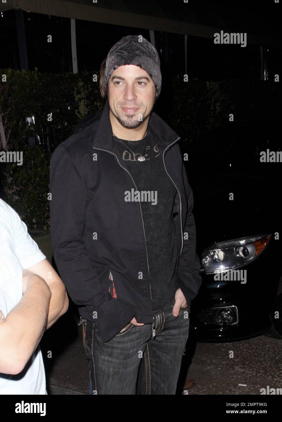 Exclusive!! Rocker and former 'American Idol' contestant Chris Daughtry leaves the restaurant Ago with a group of friends. When asked who he plans to vote for, he replied 'Chuck Norris.' Los Angeles, CA. 10/5/08. All Stock Photo