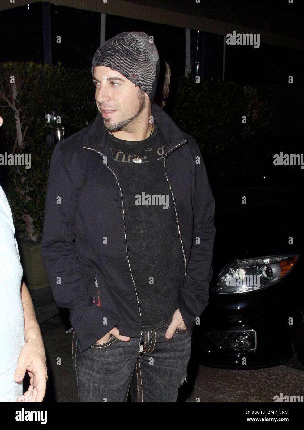 Exclusive!! Rocker and former 'American Idol' contestant Chris Daughtry leaves the restaurant Ago with a group of friends. When asked who he plans to vote for, he replied 'Chuck Norris.' Los Angeles, CA. 10/5/08. All Stock Photo