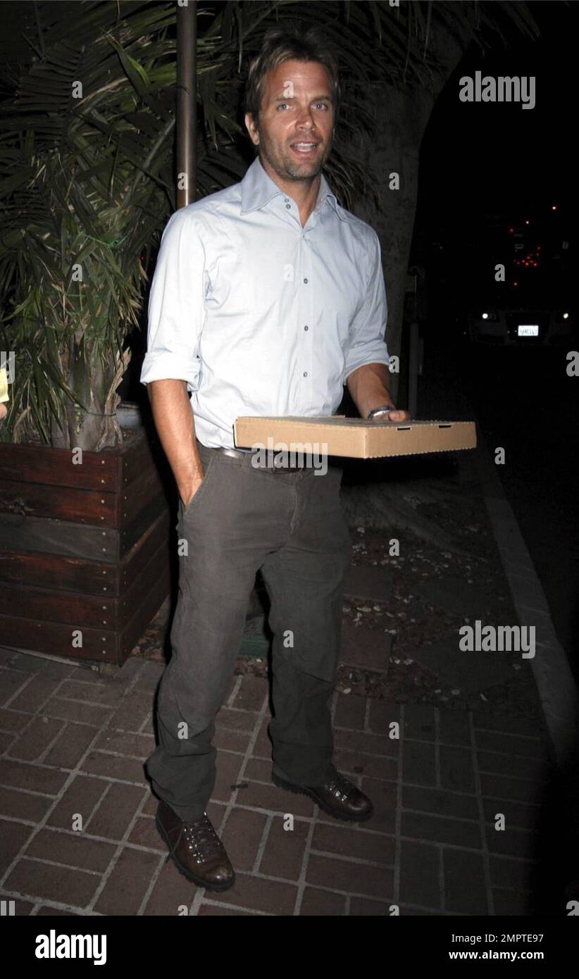 "Baywatch" stud David Chokachi jokingly shows off his belly as he
