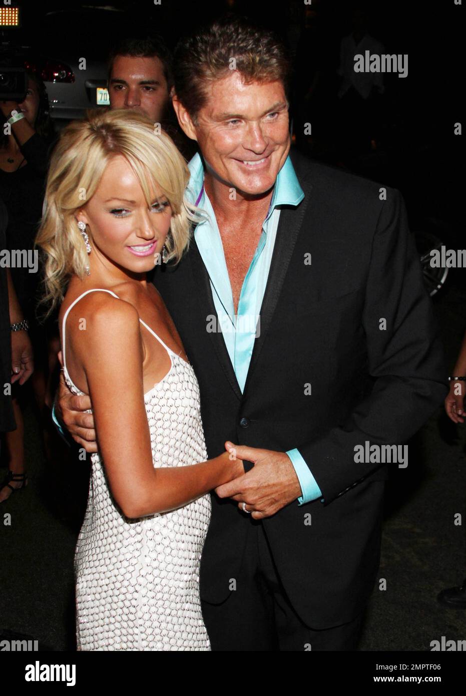 Former 'Baywatch' star David Hasselhoff along with girlfriend Hayley  Roberts celebrate his 60th birthday at the Greystone Manor Supperclub in  Hollywood. David wore a black suit with a blue satin half unbuttoned