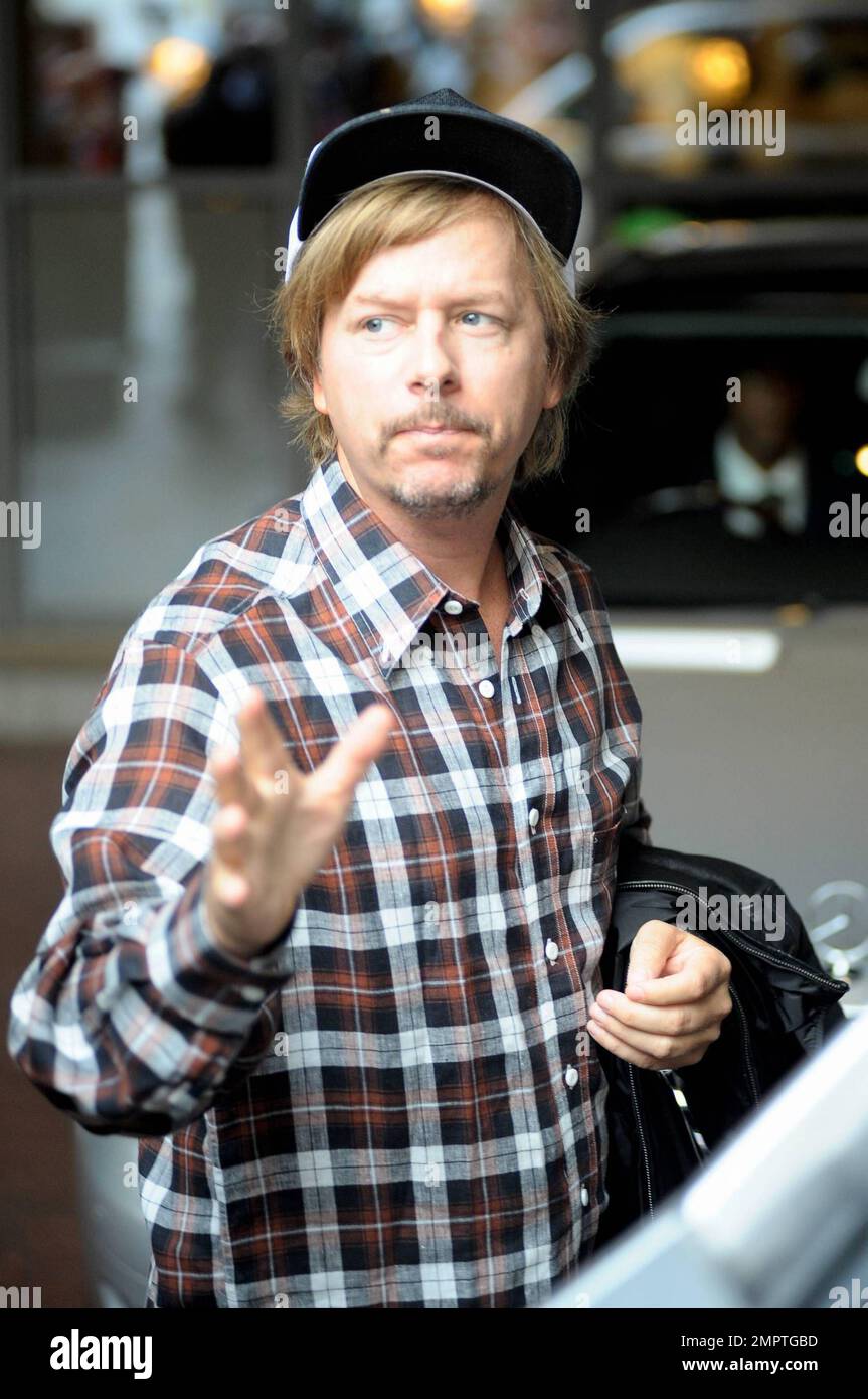 Funnyman and "Grown Ups" star David Spade signs autographs and waves to  fans as he leaves his luxury hotel in London, UK. 7/26/10 Stock Photo -  Alamy