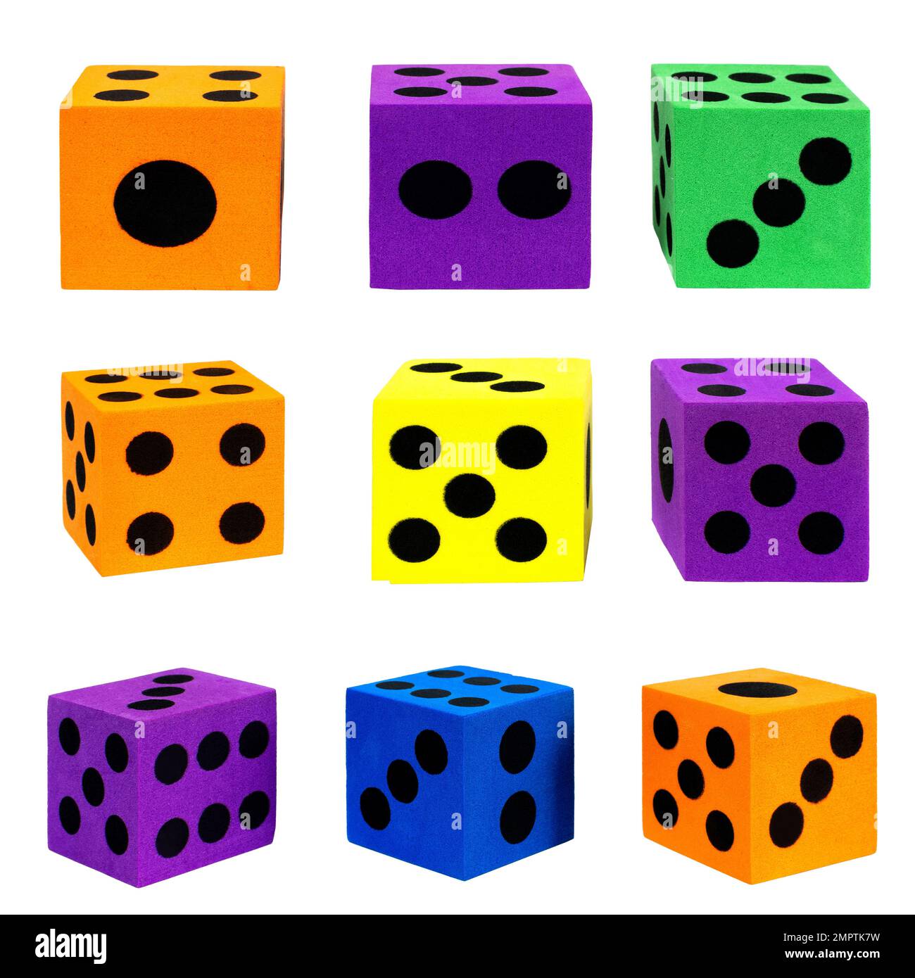 A collection of colorful foam dice isolated on the empty white