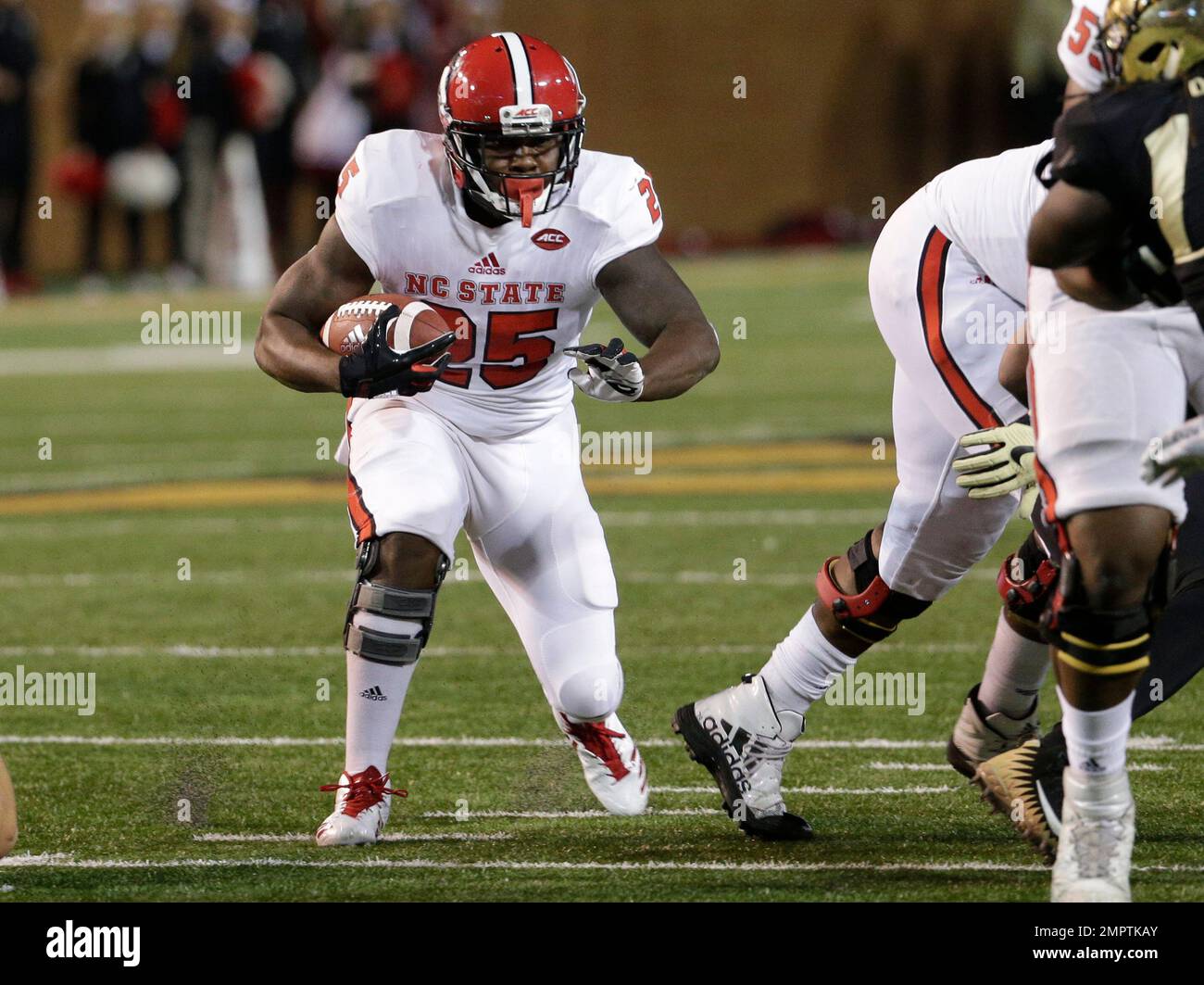 North Carolina State's Reggie Gallaspy II (25) runs against Wake Forest