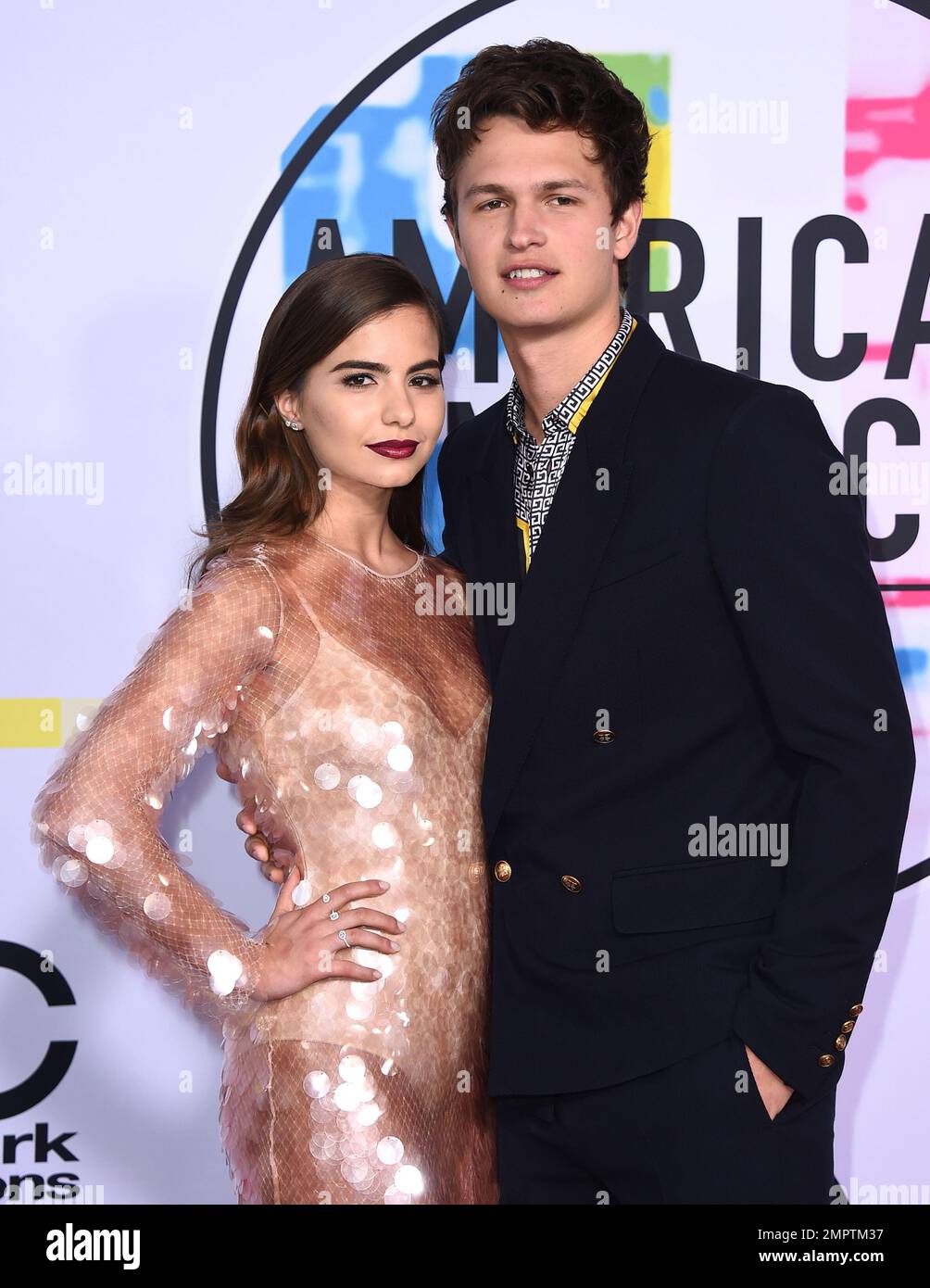 Violetta Komyshan, left, and Ansel Elgort arrive at the American Music