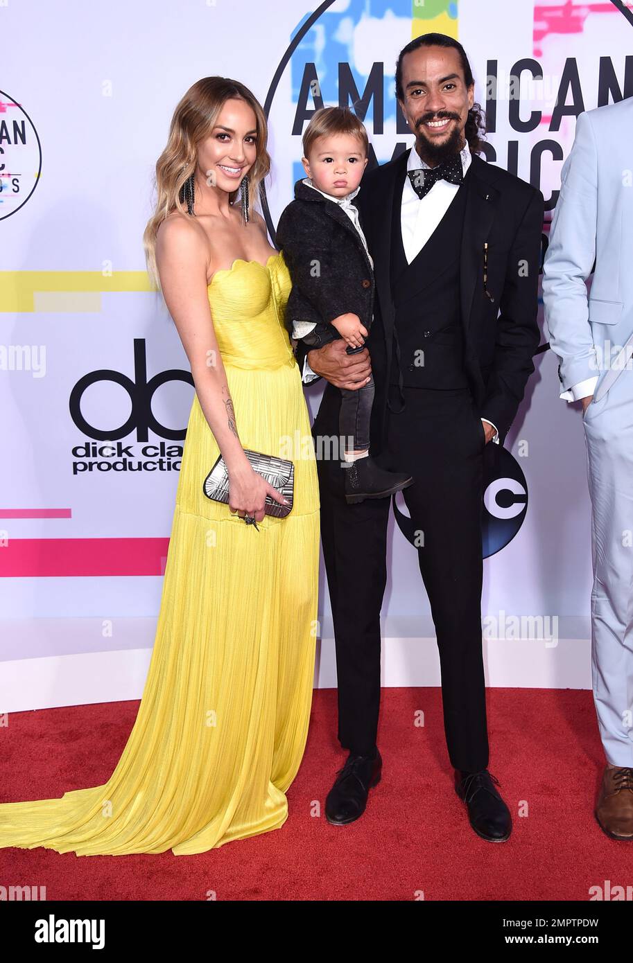 Kimberly Ryan, from left, Leif Naess, and Ross Naess arrive at the