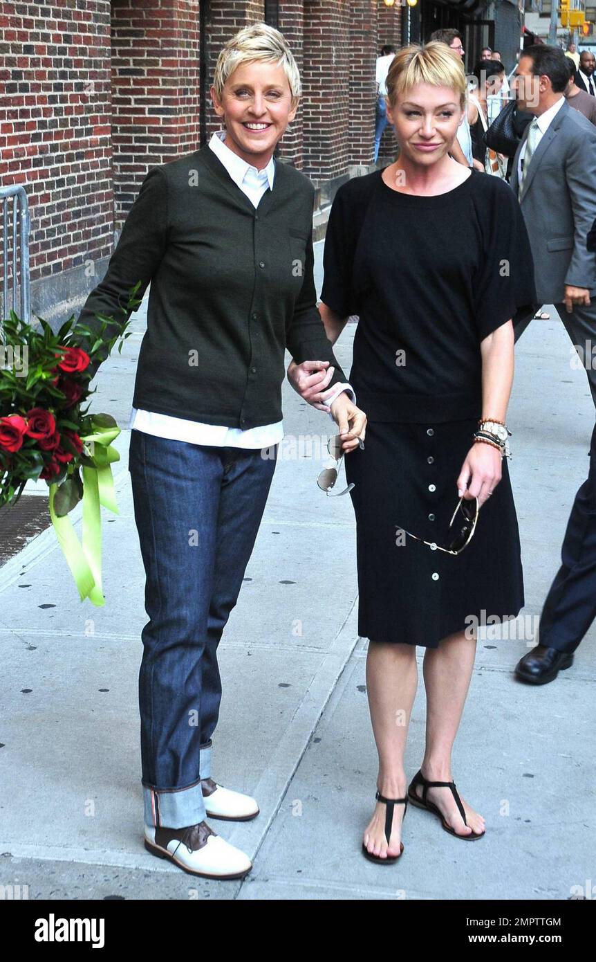 Comedian and talk show host Ellen DeGeneres holds hands with wife actress Portia  de Rossi as they leave the Ed Sullivan Theater. DeGeneres appeared on the  Late Show with David Letterman to, image size:862x1390