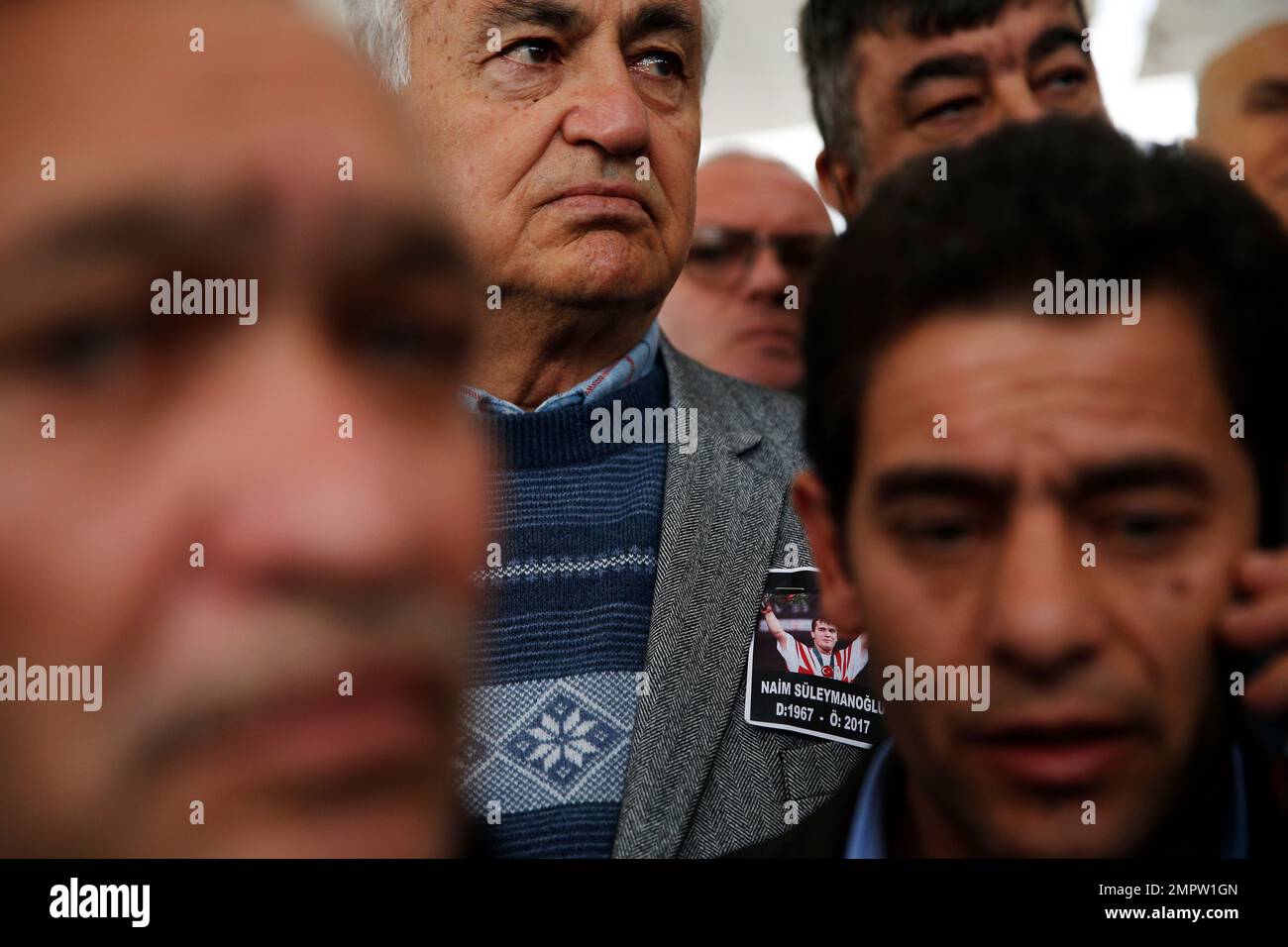 Mourners attend the funeral ceremony of Turkish weightlifter Naim ...