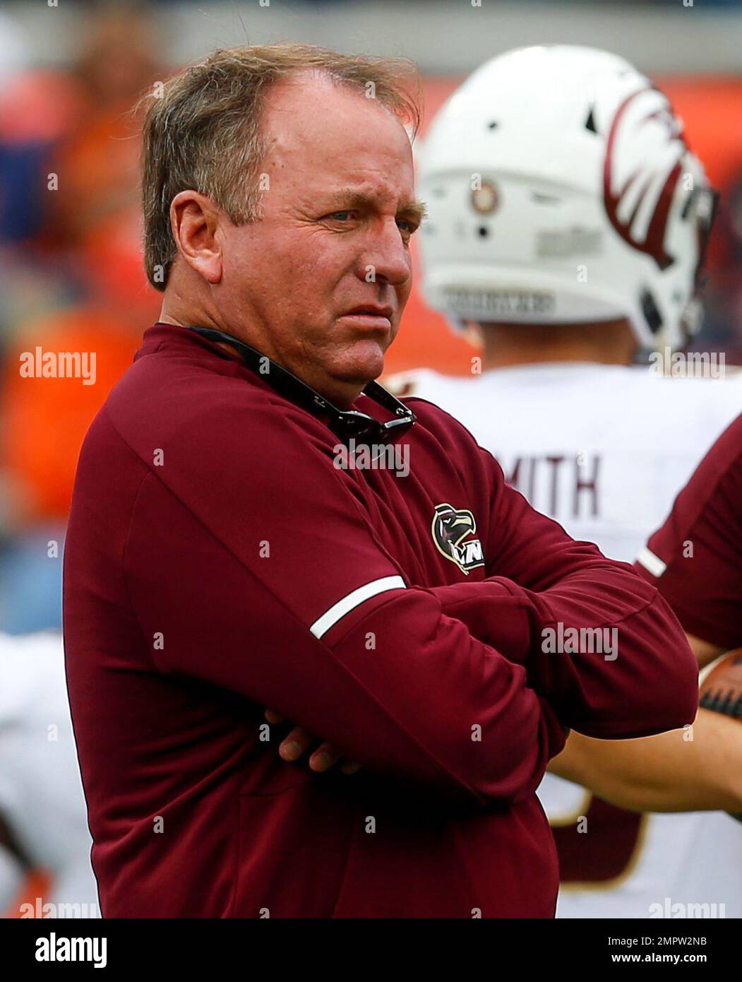 Louisiana Monroe head coach Matt Viator watches team warm up before the