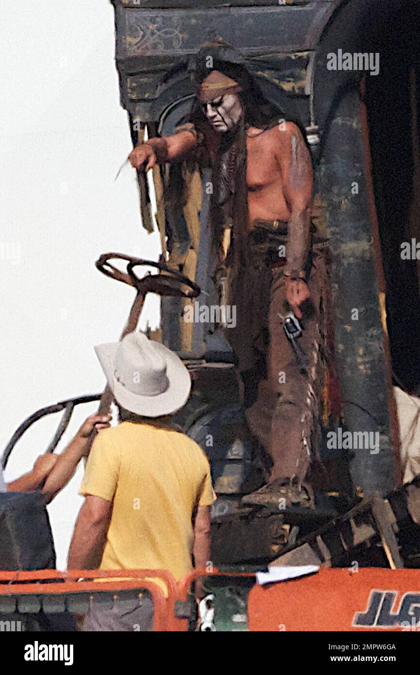 Lone Ranger Hammer Johnny Depp and Armie Hammer, dressed in their characters Tonto and the ...