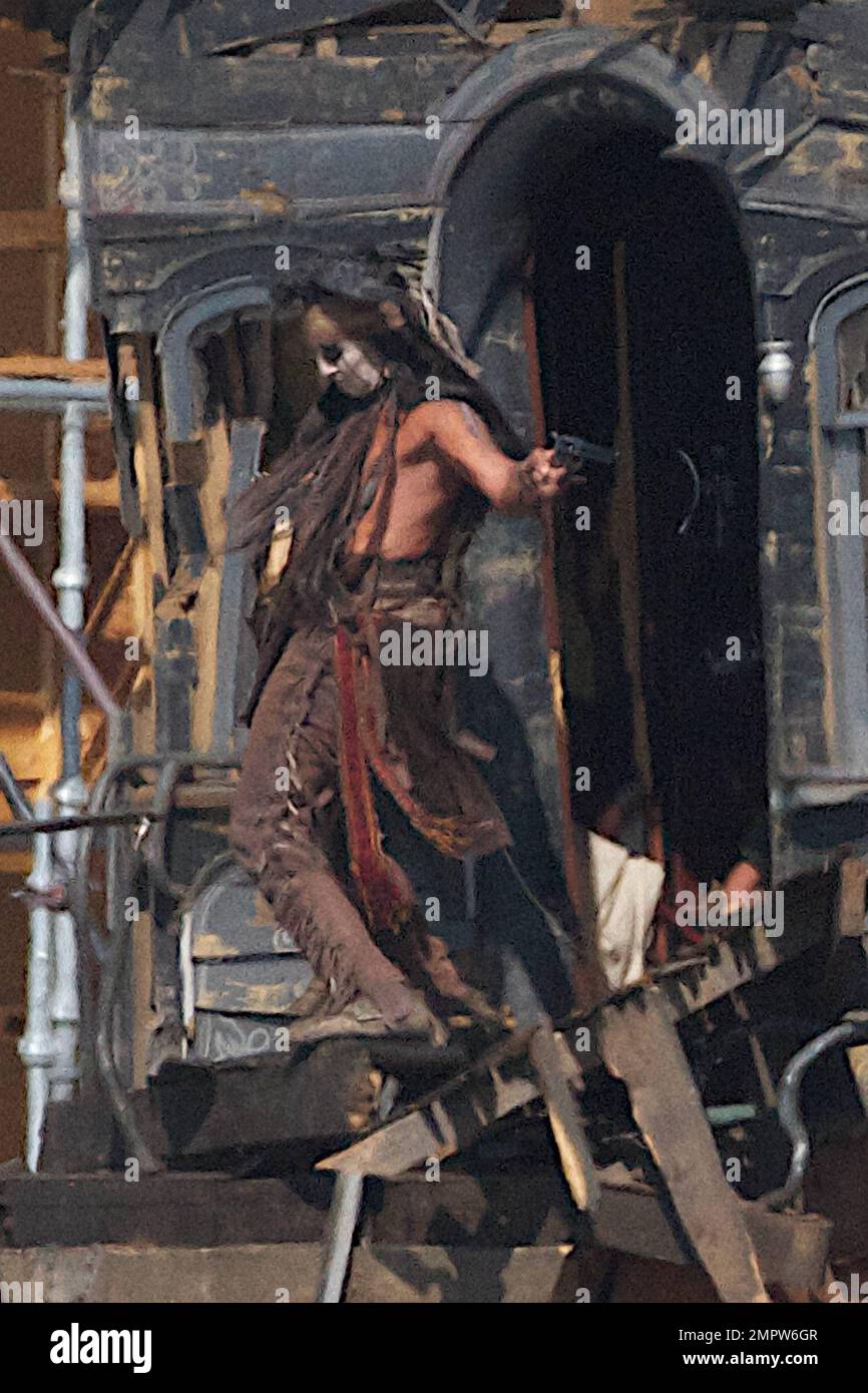 Lone Ranger Hammer Johnny Depp and Armie Hammer, dressed in their characters Tonto and the ...