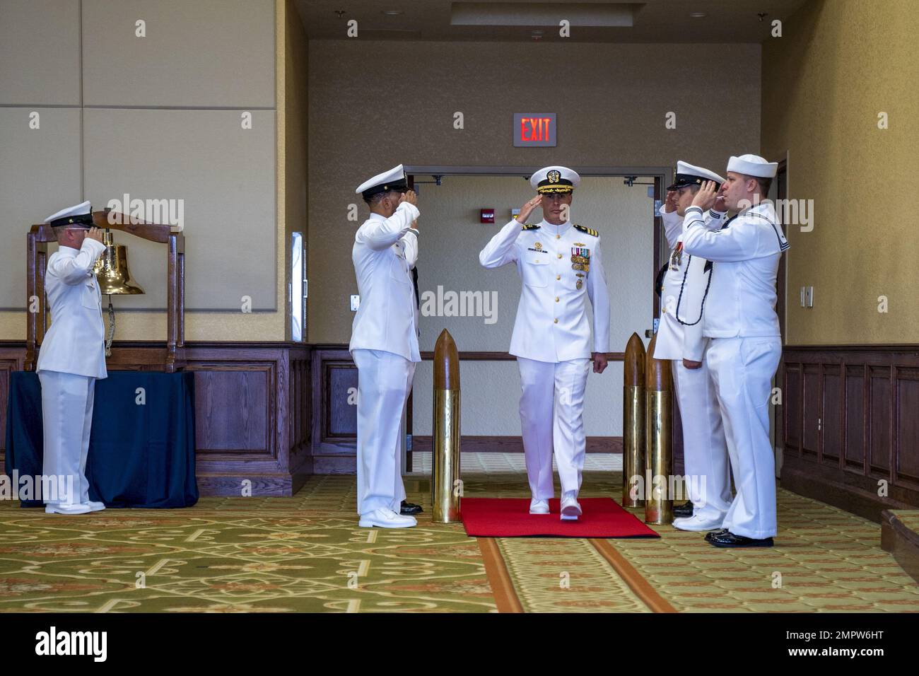 U.S. Navy Cmdr. David Marino, Center for Naval Aviation Technical Training Unit Keesler outgoing commander, arrives at the CNATTU Keesler change of command ceremony in the Bay Breeze Event Center on Keesler Air Force Base, Mississippi, Nov. 17, 2022. The ceremony welcomed Cmdr. Jeff Portell, CNATTU Keesler incoming commander, and said farewell to Marino. Stock Photo