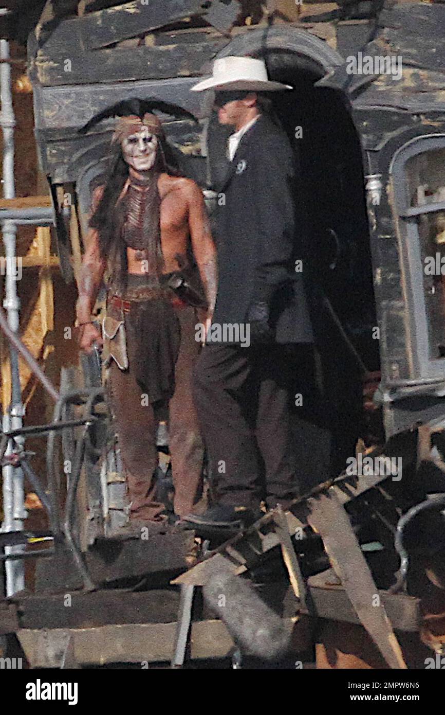 Lone Ranger Hammer Johnny Depp and Armie Hammer, dressed in their characters Tonto and the ...