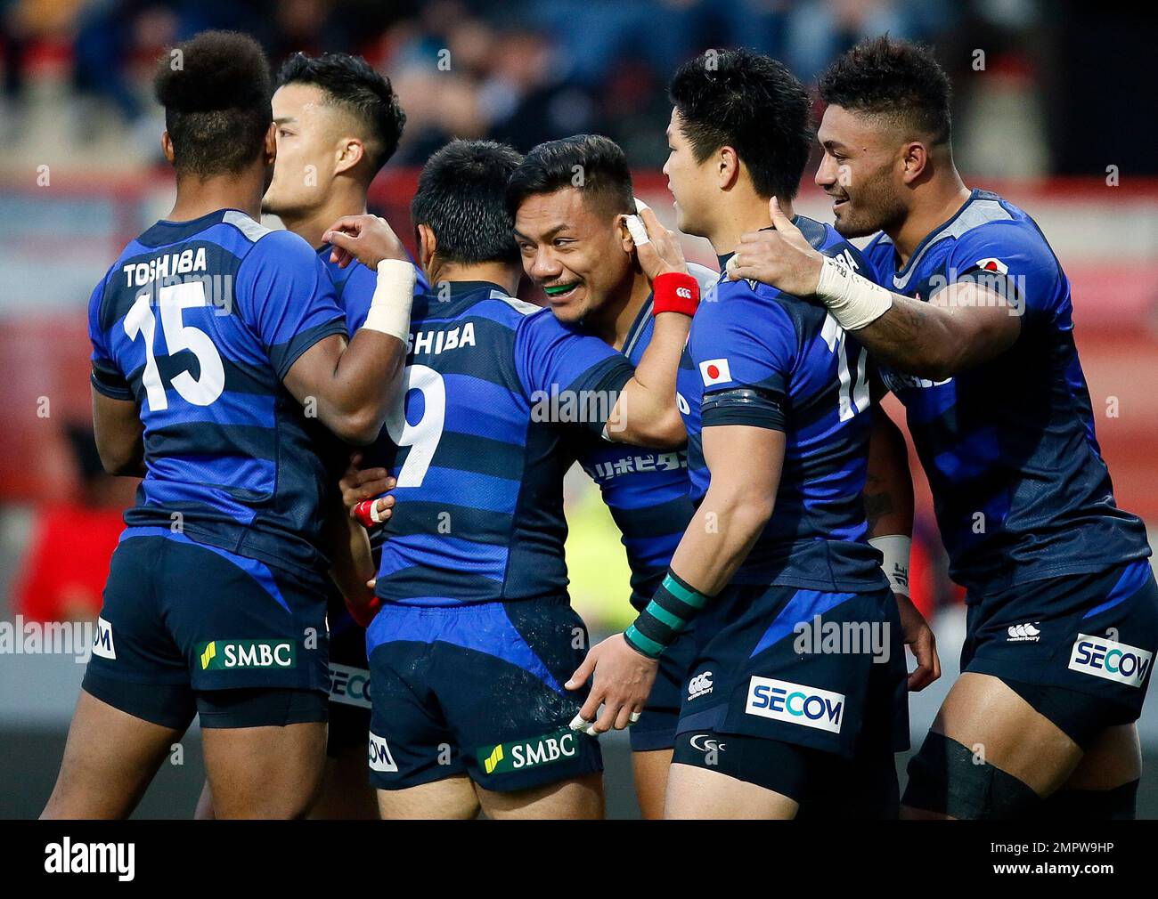 Japan's Lomano Lava Lemeki, center, reacts with his teammates after scored  a try against Tonga during a rugby union international match at Ernest  Wallon stadium in Toulouse, southwestern France, Saturday, Nov. 18,