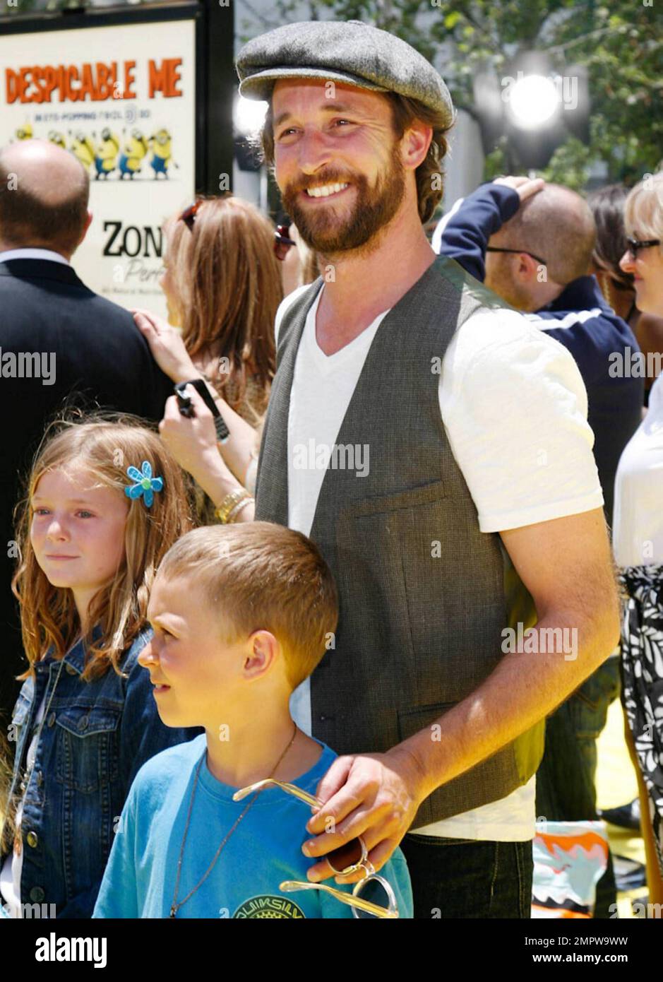 Noah Wyle and family pose on the yellow carpet at the premiere of(09)