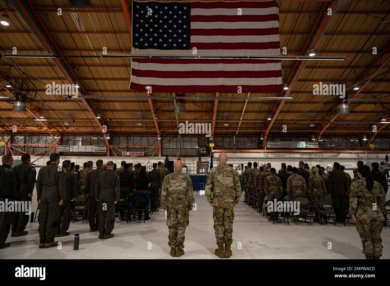 Airmen from the 49th Aircraft Maintenance Squadron stand for the pledge