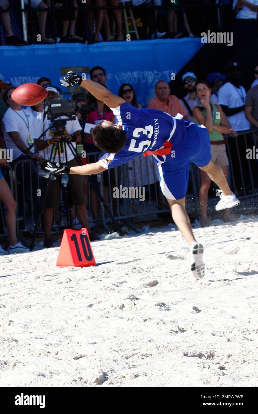 Taylor Lautner plays in the Fourth Annual DirecTV Celebrity Beach Bowl at DirecTV Celebrity Beach Bowl Stadium South Beach