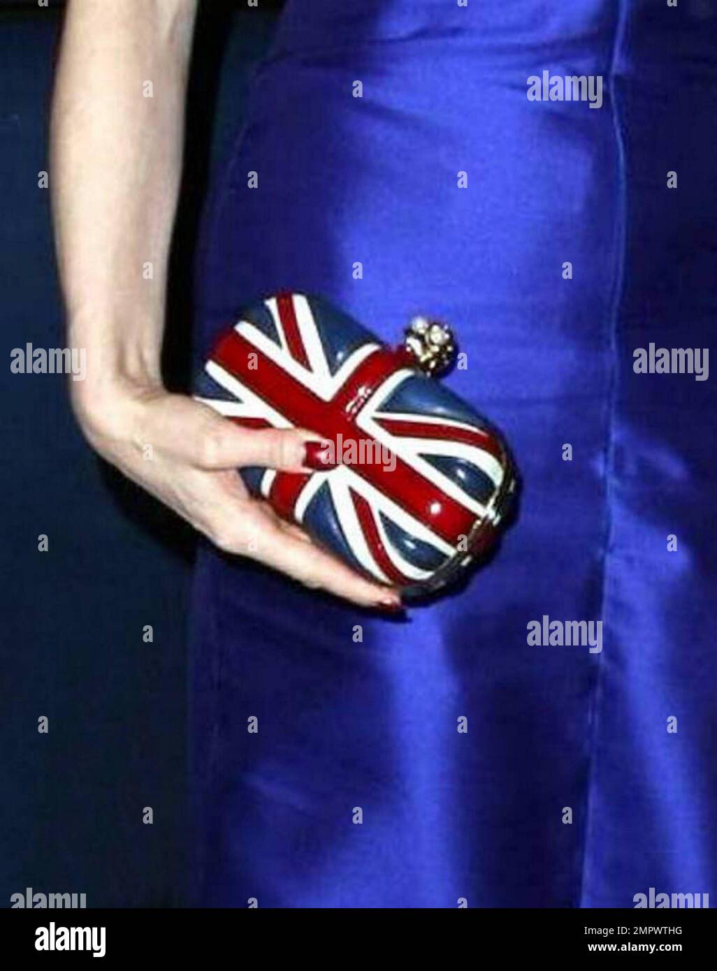 Dita Von Teese salutes the UK carrying a leather Union Jack purse ...