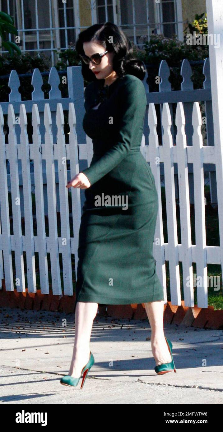EXCLUSIVE!! Burlesque beauty Dita Von Teese looks stunning in a green  zippered pencil dress with matching heels as she leaves a business  appointment in Hollywood. Los Angeles, CA 12/8/09 Stock Photo - Alamy