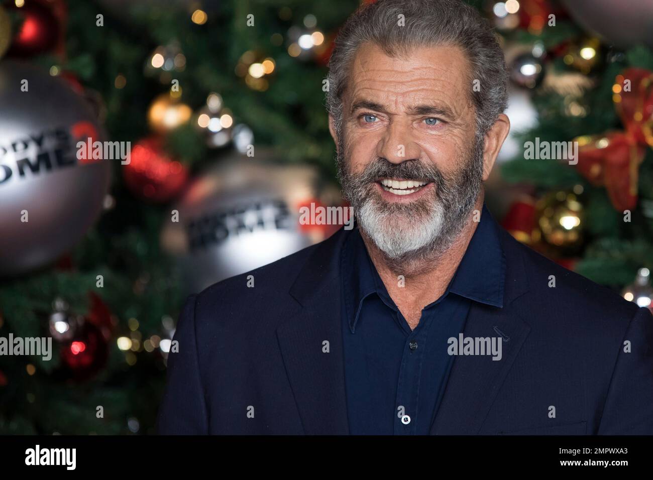 Actor Mel Gibson poses for photographers upon arrival at the premiere