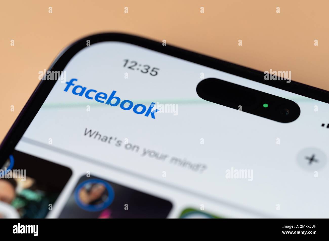 New york, USA - January 28, 2022: Using Facebook app on iphone 14 pro ...