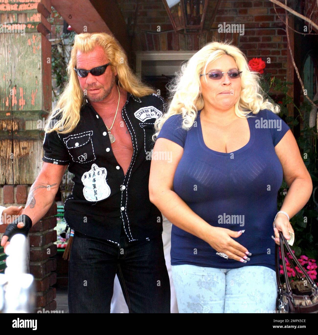 Dog the Bounty Hunter and wife Beth Smith Chapman leave The Ivy. West