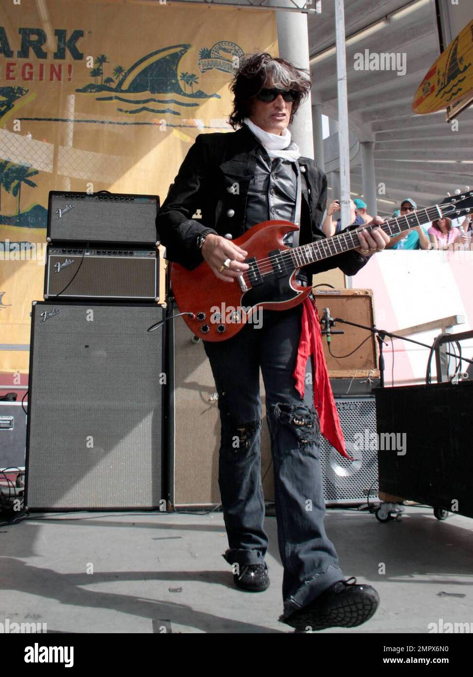 Aerosmith guitarist Joe Perry rehearses at the Celebrity Orange Carpet