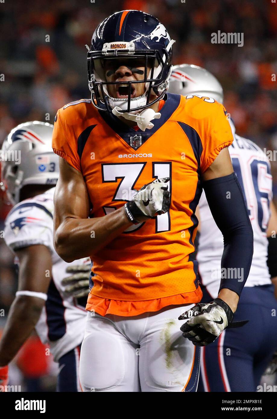 Denver Broncos strong safety Justin Simmons (31) celebrates a tackle ...