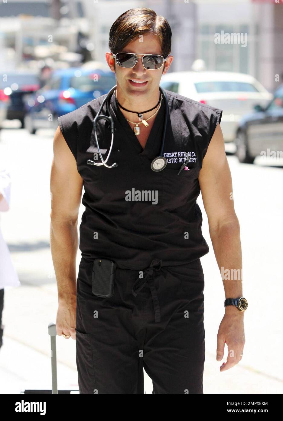 With a stethoscope around his neck, plastic surgeon Robert Rey (aka Dr ...