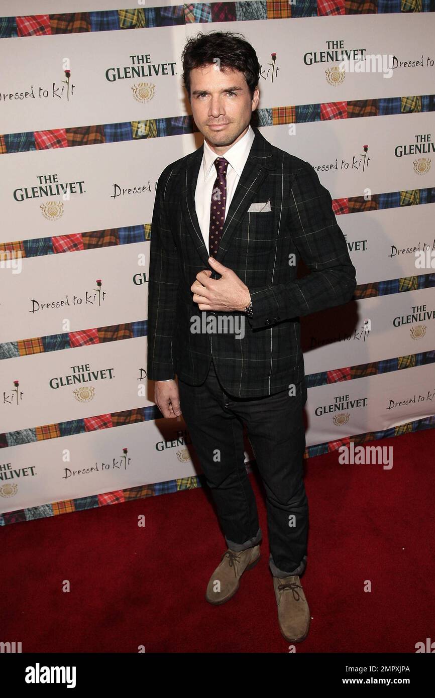 Actor Matthew Settle poses for photographers at the 9th Annual &lsquo;Dressed