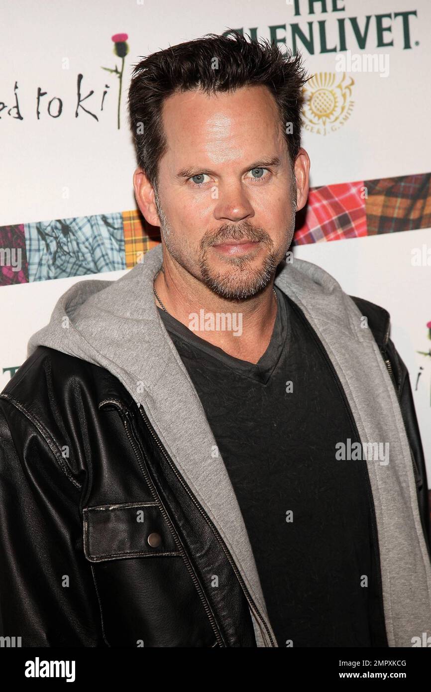 Musician Gary Allan poses for photographers at the 9th Annual 'Dressed
