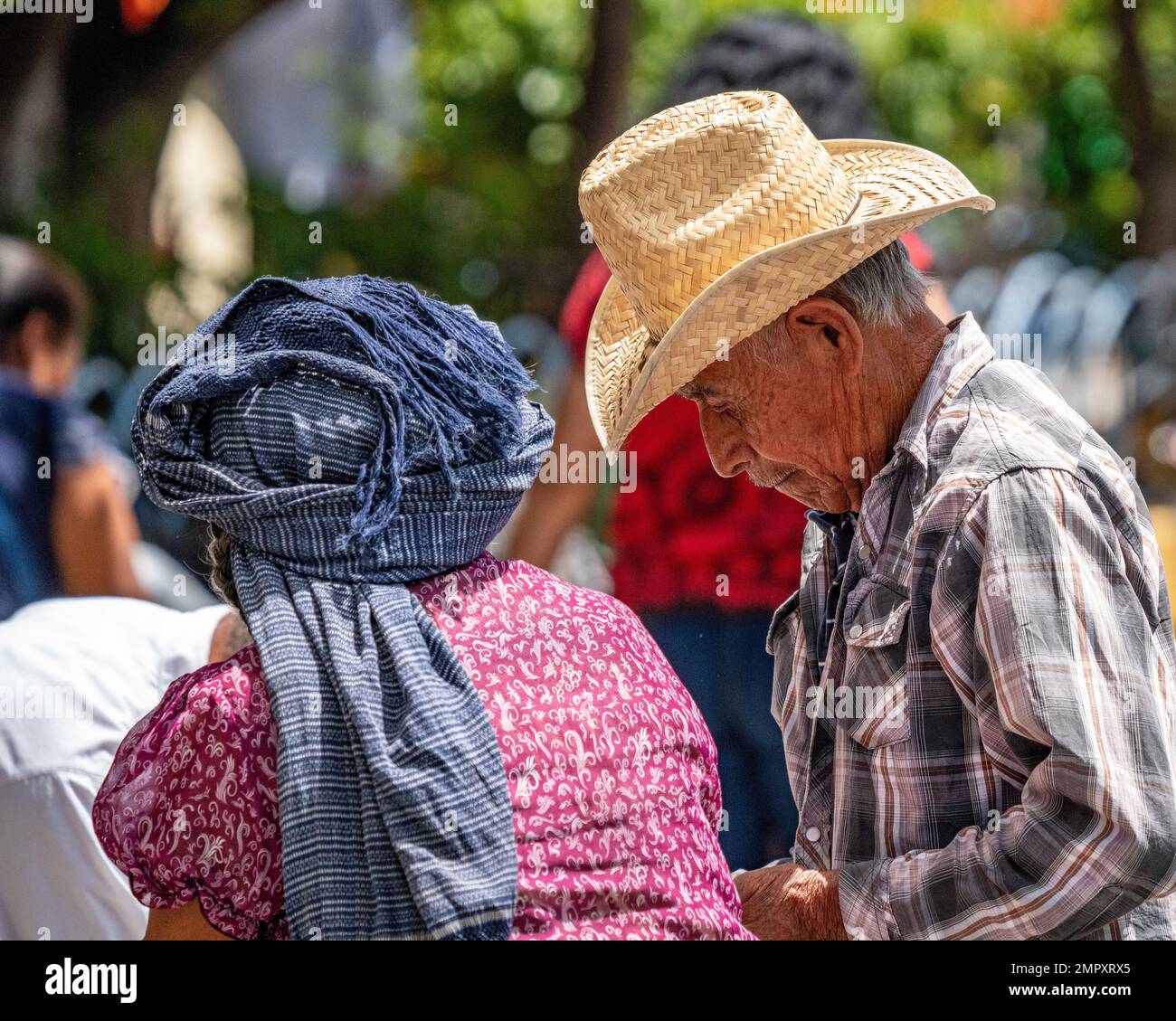 An older indigenous couple in the market in Ocotlan de Morelos in the Central Valleys of Oaxaca
