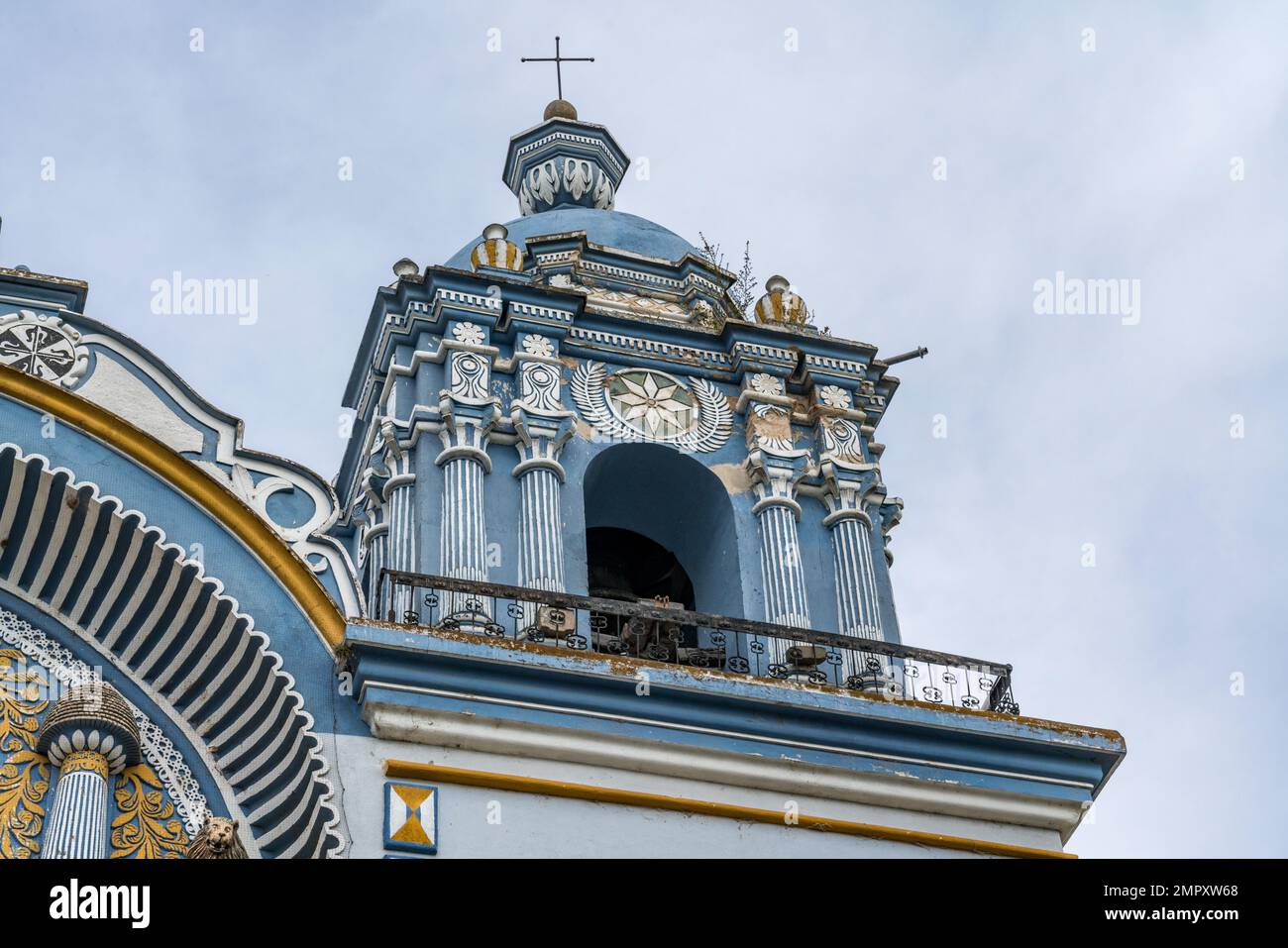 The the colorful painted bell tower of the Church of Santo Domingo de Guzman in Ocotlan de Morelos, Oaxaca, Mexico. Stock Photo