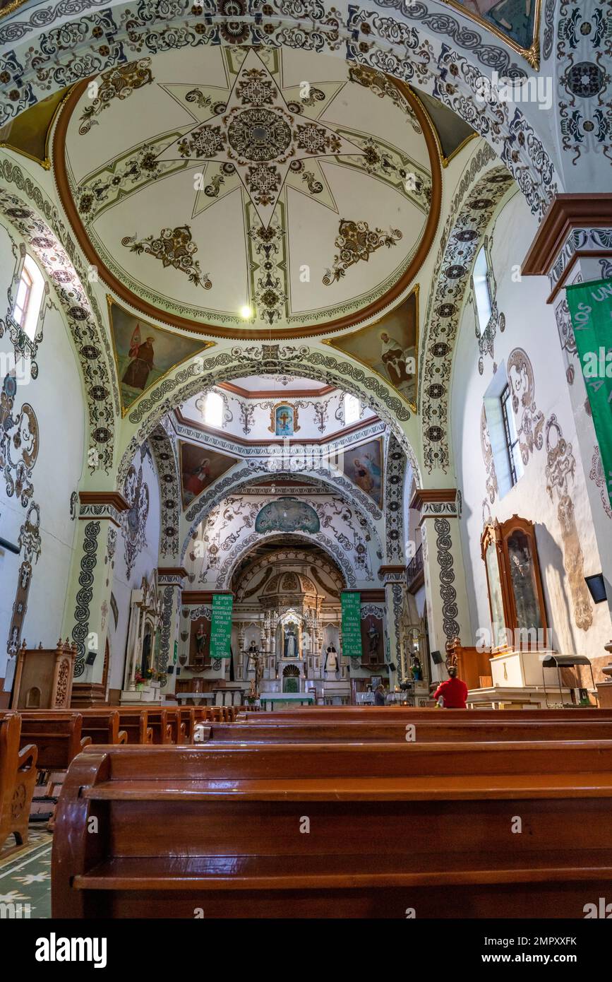 Ornately decorated restored nave of the Church of Santo Domingo de Guzman in Ocotlan de Morelos, Oaxaca, Mexico. Stock Photo