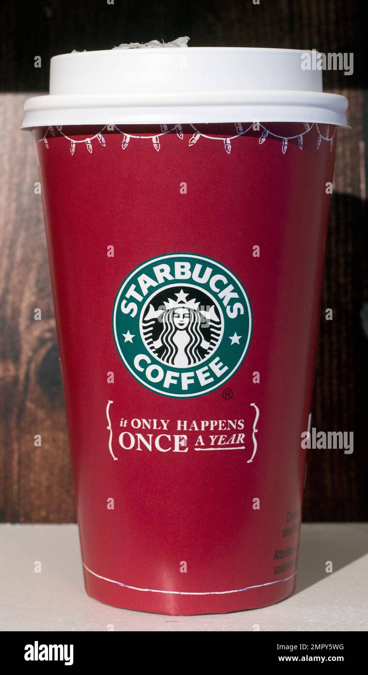 A 2005 Starbucks holiday cup is displayed, Thursday, Nov. 9, 2017, at a  Starbucks in New York. The Seattle-based company is celebrating 20 years of  holiday coffee cups. (AP Photo/Mark Lennihan Stock