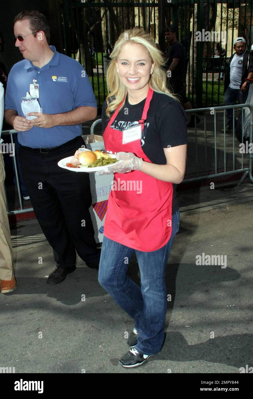 Tiffany Thornton volunteers at the LA Mission on Good Friday in Los Angeles, CA. 4/2/10. Stock Photo