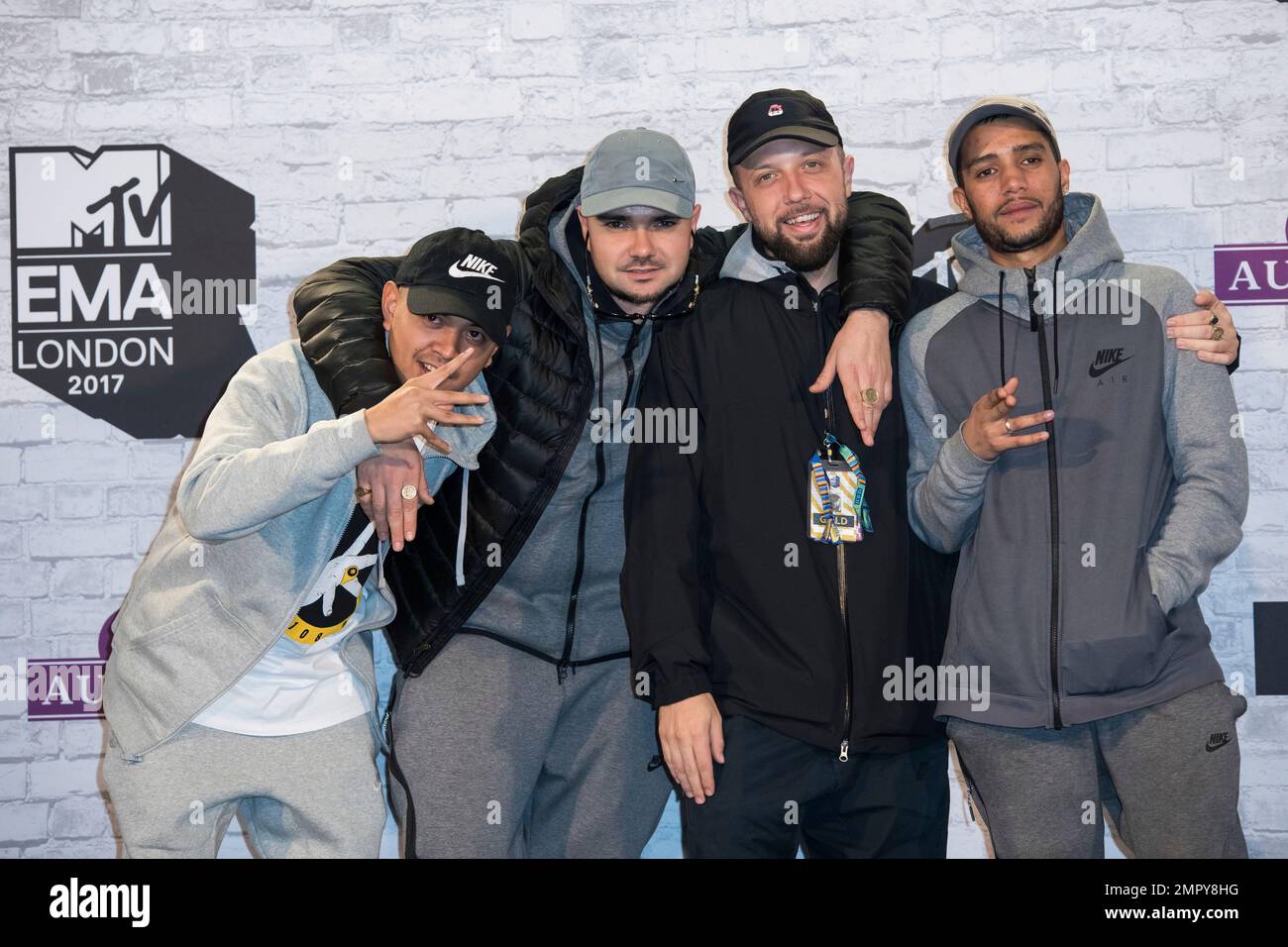 Members of Kurupt FM pose for photographers backstage at the MTV