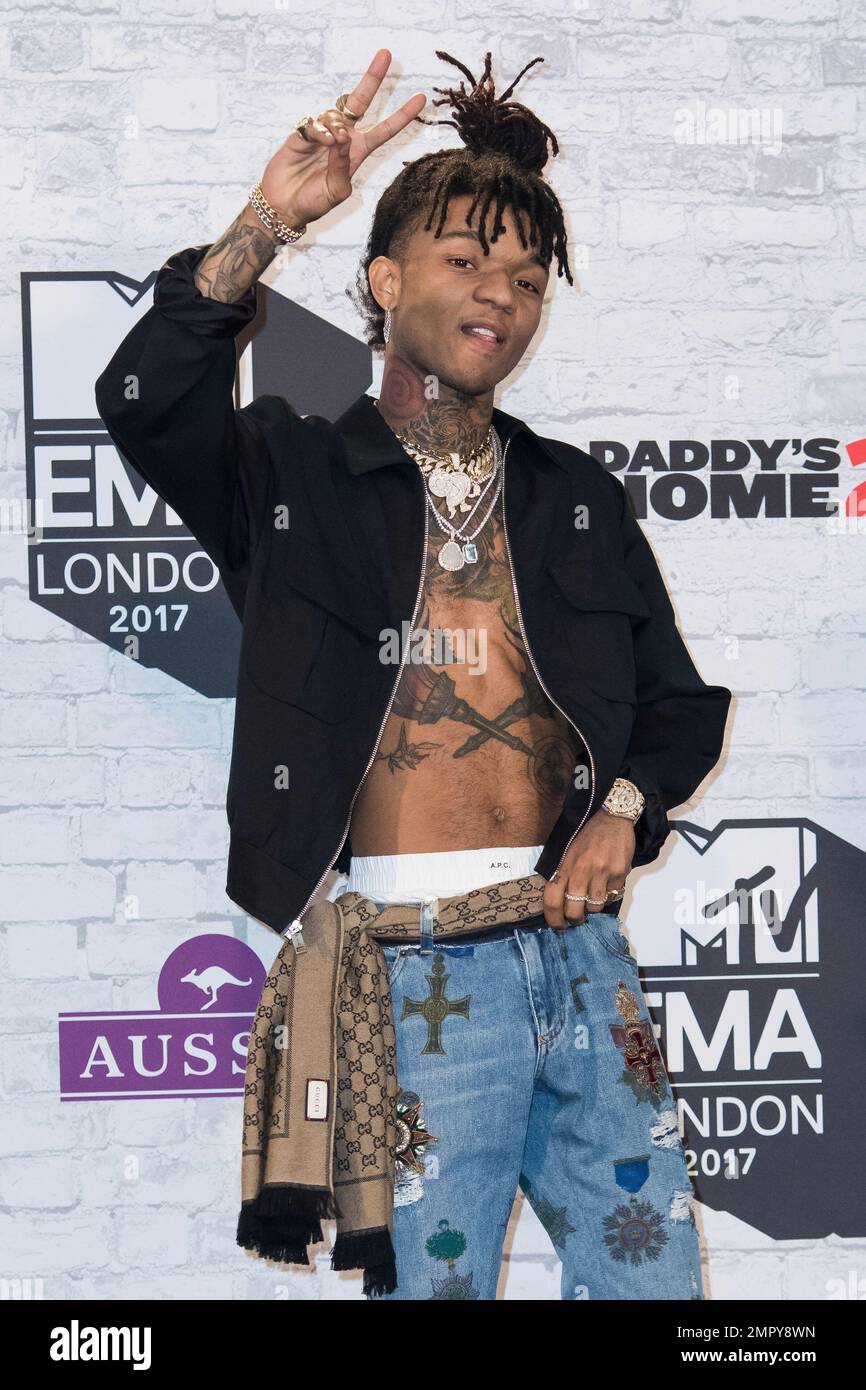 Swae Swae Lee poses for photographers backstage at the MTV European Music ...