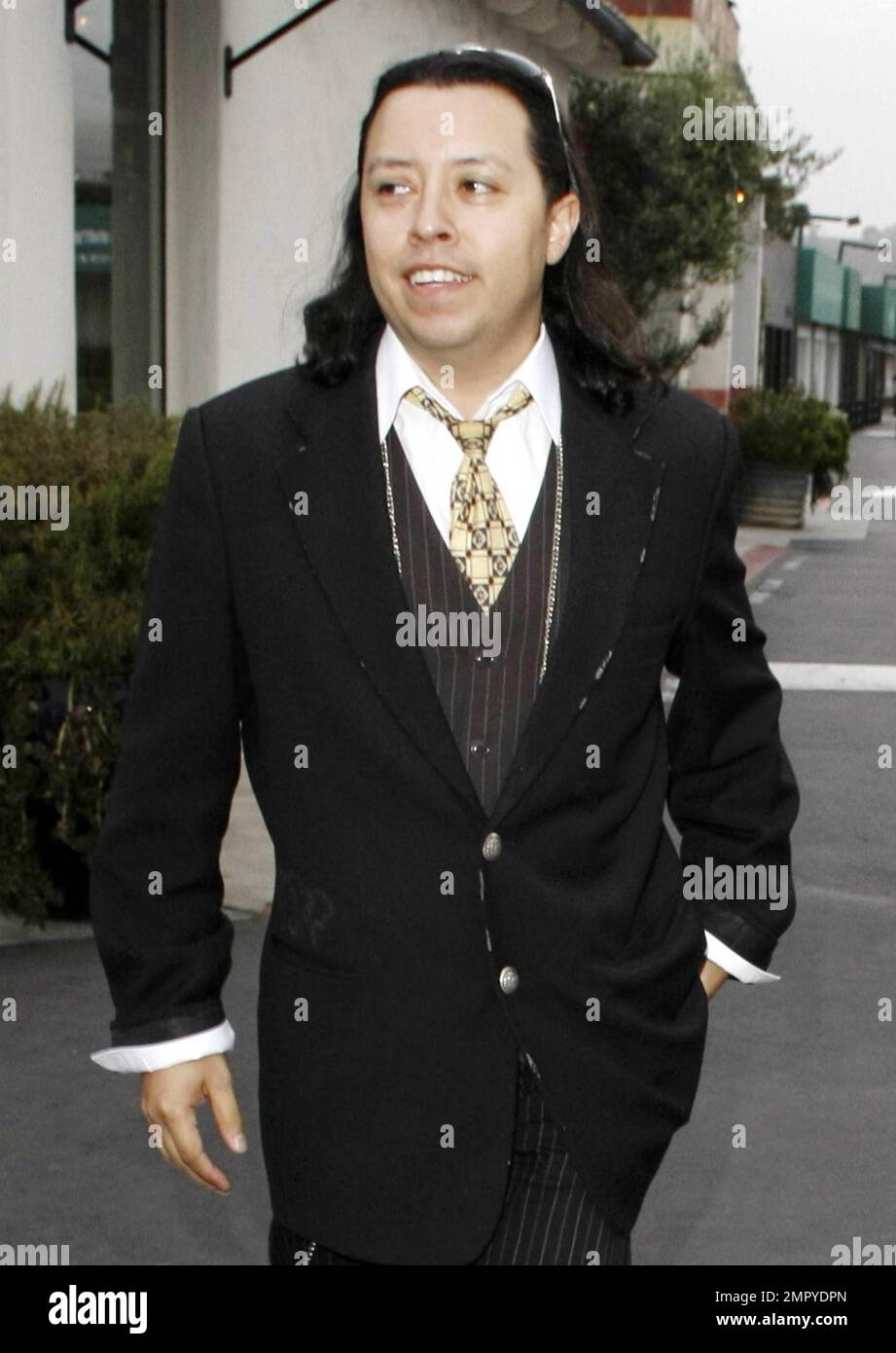 Actor Efren Ramirez arrives to the Malibu Lumber Yard with a 