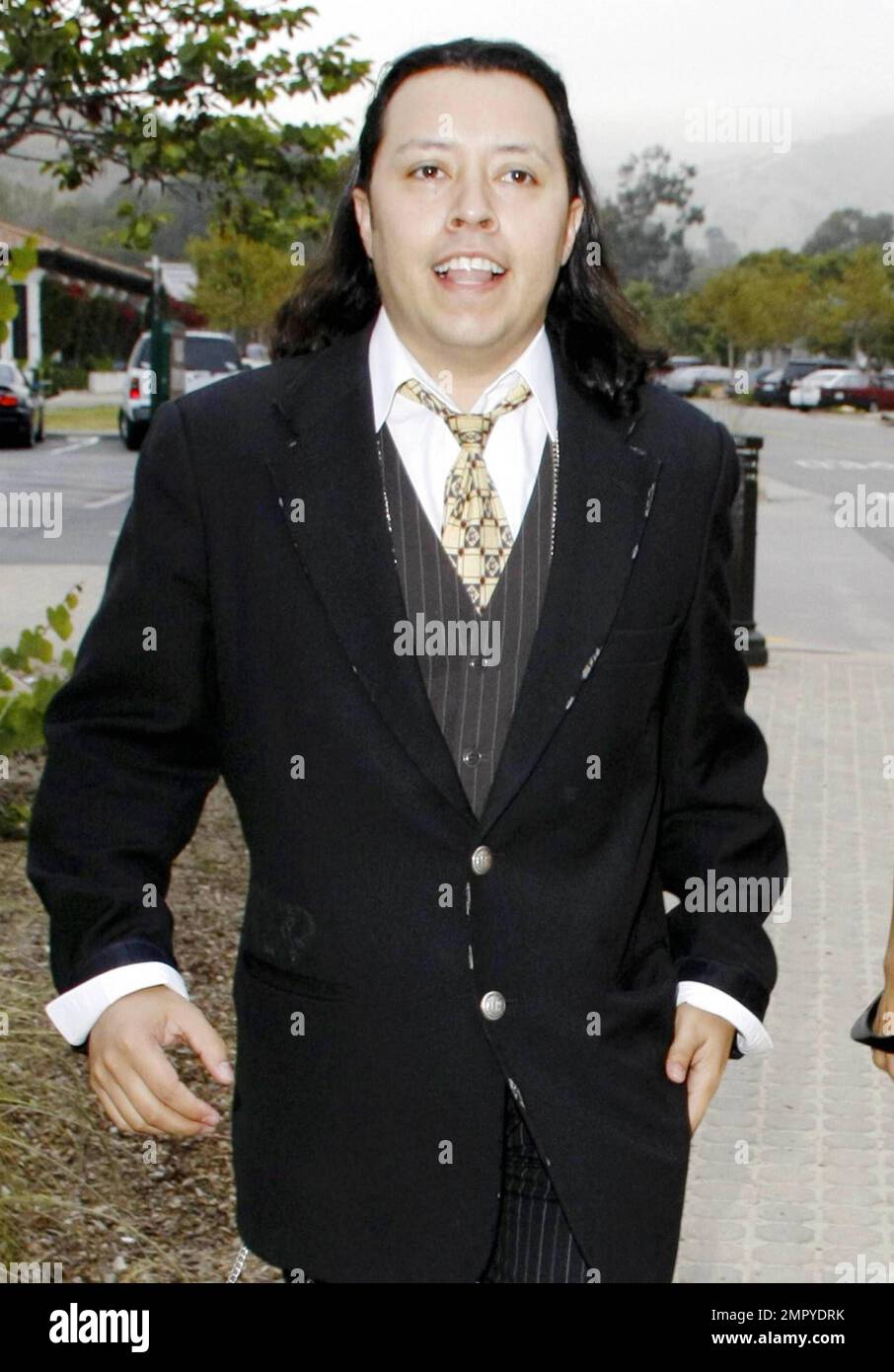 Actor Efren Ramirez arrives to the Malibu Lumber Yard with a 