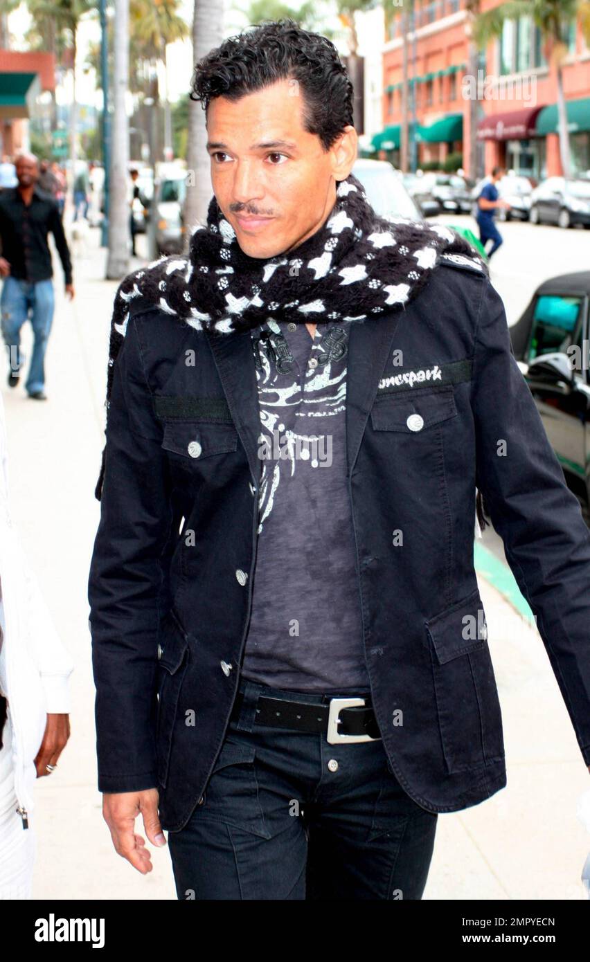 Singer El DeBarge dons a trendy scarf while out with a friend. Los Angeles, CA. 02/23/10. Stock Photo