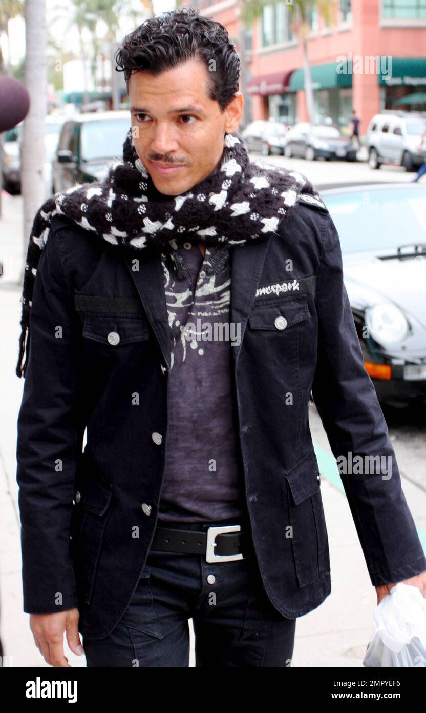 Singer El DeBarge dons a trendy scarf while out with a friend. Los Angeles, CA. 02/23/10.   . Stock Photo