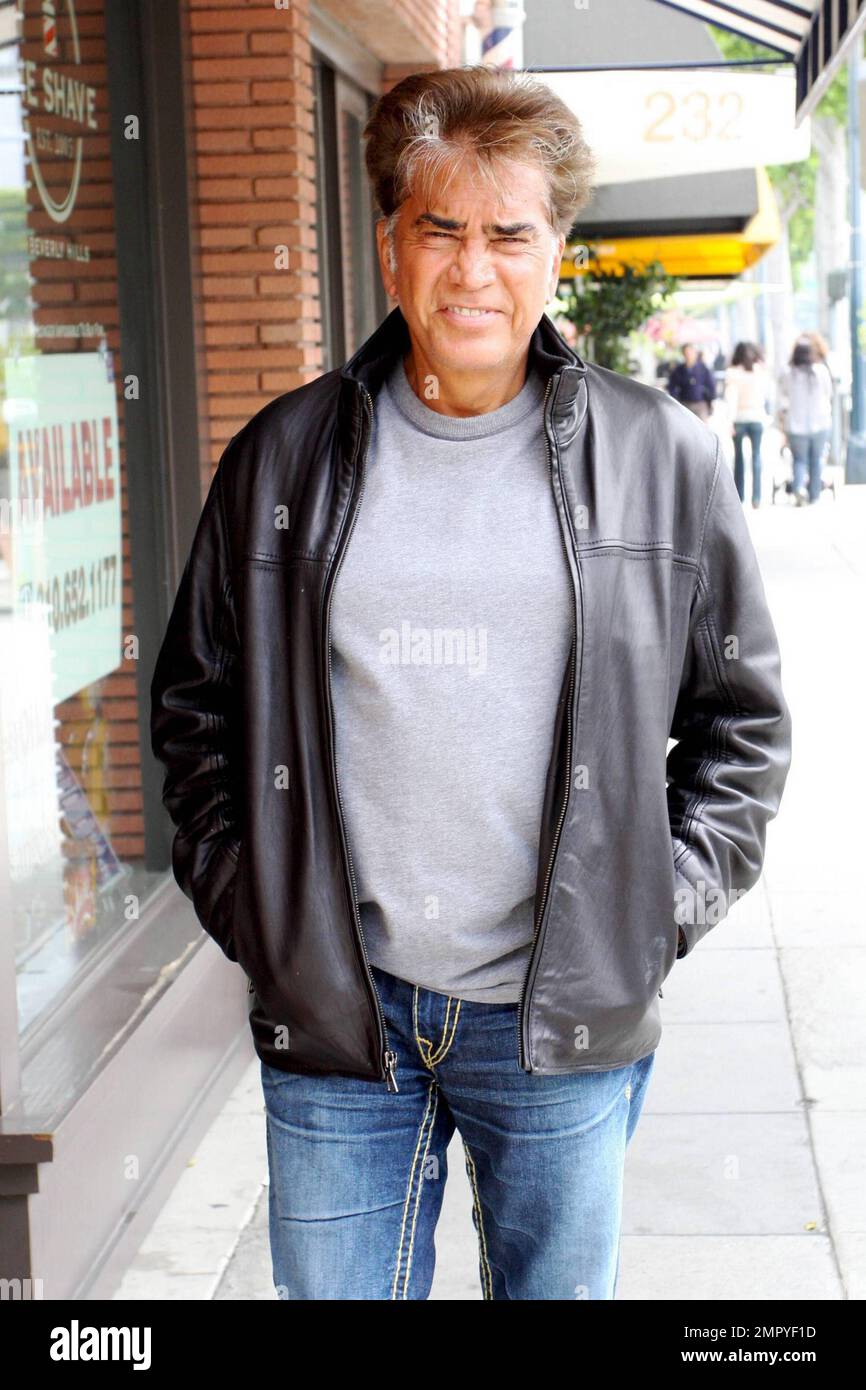 EXCLUSIVE!! Latin music superstar Jose Luis Rodrigues (aka El Puma) poses  for photos while strolling in Beverly Hills, CA. 4/27/10. B Stock Photo -  Alamy