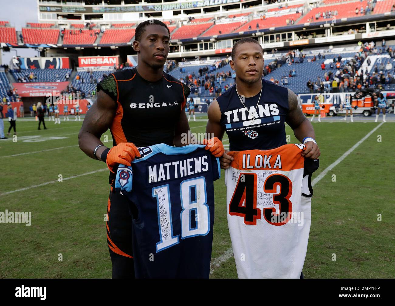 Cincinnati Bengals free safety George Iloka, left, trades jerseys with  Tennessee Titans wide receiver Rishard Matthews, right, after an NFL  football game Sunday, Nov. 12, 2017, in Nashville, Tenn. The Titans won