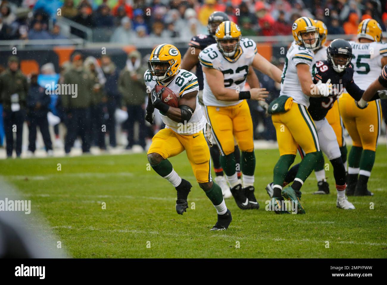Green Bay Packers running back Ty Montgomery (88) breaks away from the  Chicago Bears defense for a touchdown during the first half of an NFL  football game, Sunday, Nov. 12, 2017, in