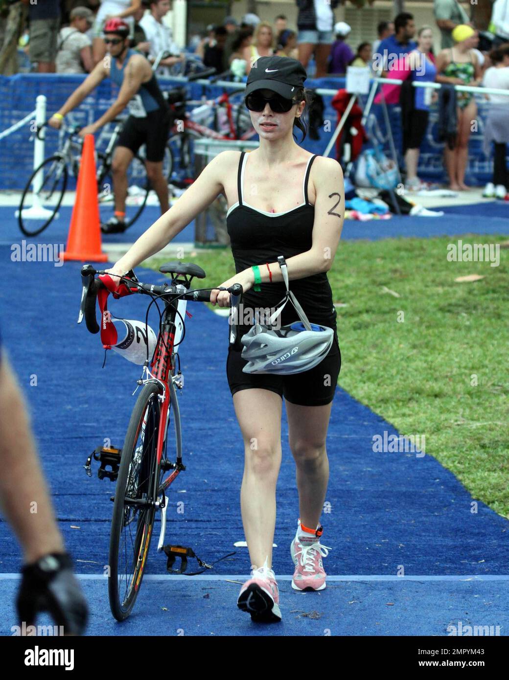 American actress, Eliza Dushku, participates with her boyfriend, former NBA  player, Rick Fox, in the Third Annual Nautica South Beach Triathlon  benefiting St. Judes Childrens Research Hospital in Miami Beach, FL.  4/11/10